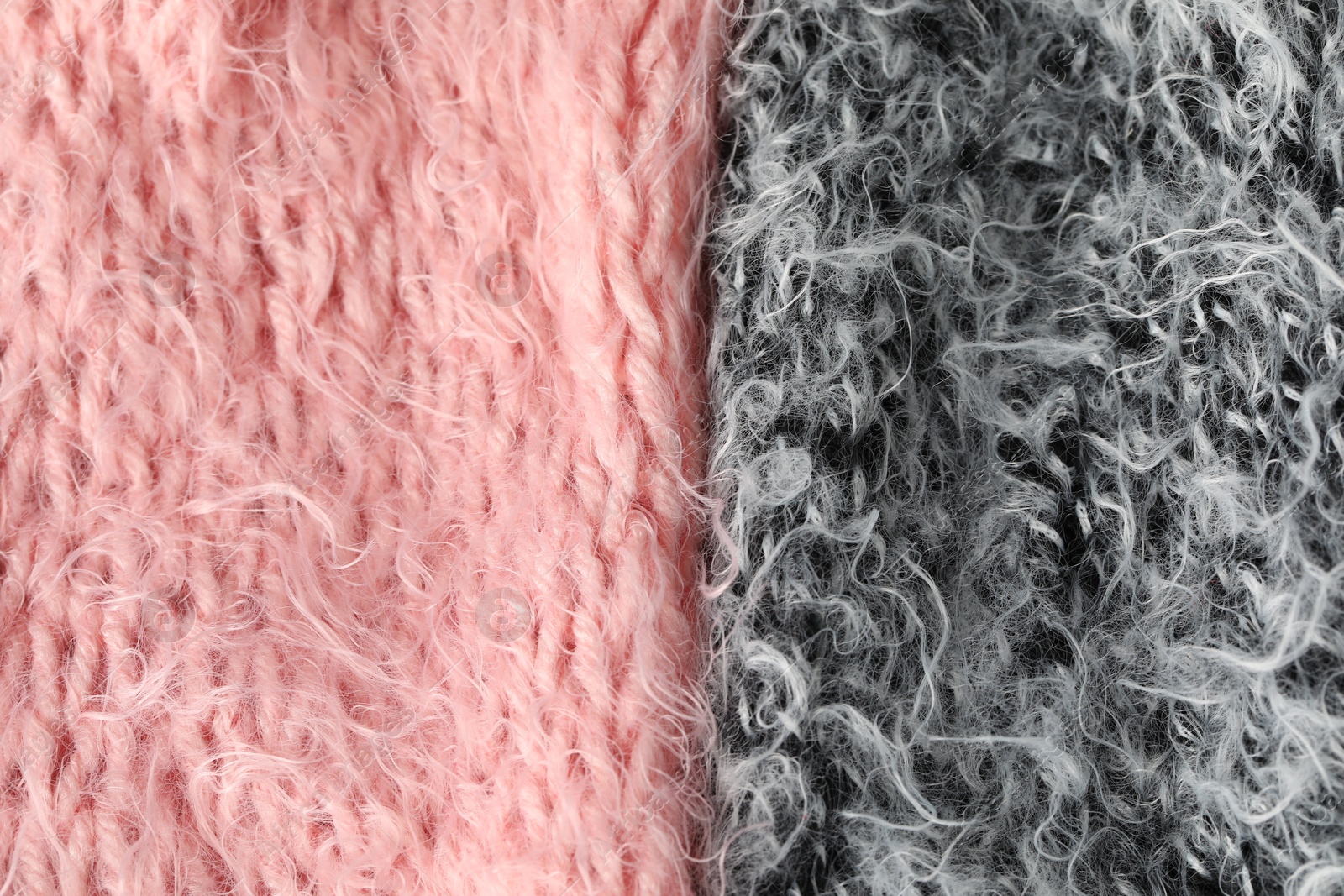 Texture of pink and grey knitted fabrics as background, top view Photo of Texture of pink and grey knitted fabrics as background, top view