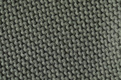 Photo of Texture of grey wool fabric as background, top view