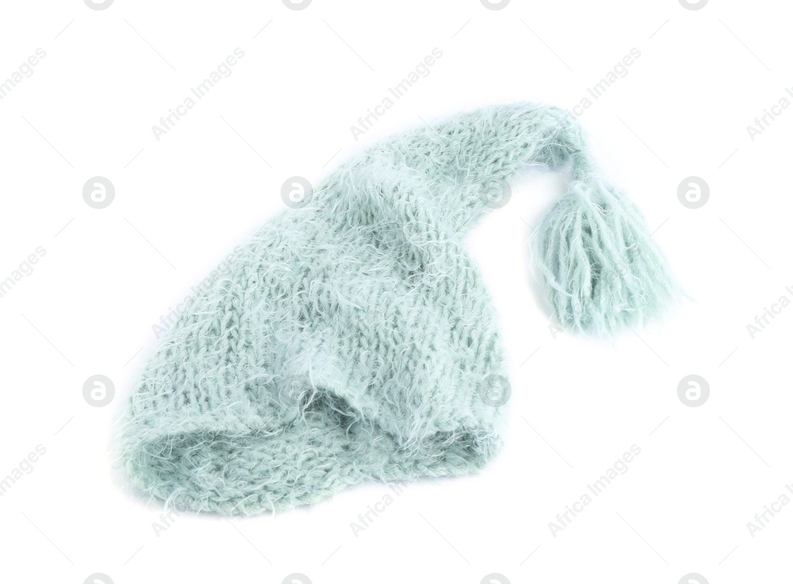 One turquoise wool hat isolated on white Photo of One turquoise wool hat isolated on white