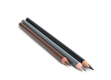 Photo of Three different eyebrow pencils isolated on white