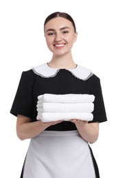 Photo of Chambermaid with stack of clean towels on white background