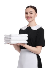 Photo of Chambermaid with stack of clean towels on white background