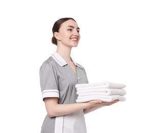 Photo of Chambermaid with stack of clean towels on white background