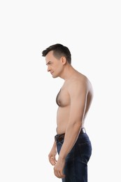 Photo of Man with incorrect posture posing on light grey background