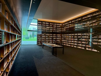 Photo of Wassenaar, Netherlands - April 24, 2025: Beautiful library with many books at Voorlinden museum