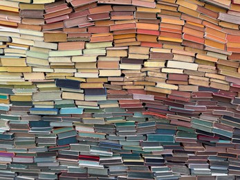 Photo of Wassenaar, Netherlands - April 24, 2025: Installation of many colorful books at Voorlinden museum