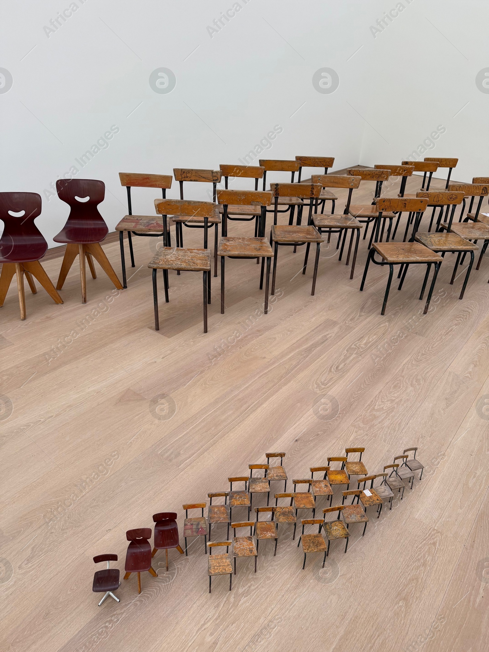 Wassenaar, Netherlands - April 24, 2025: Installation of many different chairs at Voorlinden museum Photo of Wassenaar, Netherlands - April 24, 2025: Installation of many different chairs at Voorlinden museum
