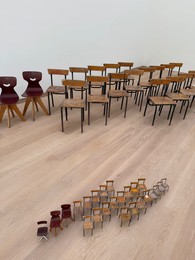 Photo of Wassenaar, Netherlands - April 24, 2025: Installation of many different chairs at Voorlinden museum