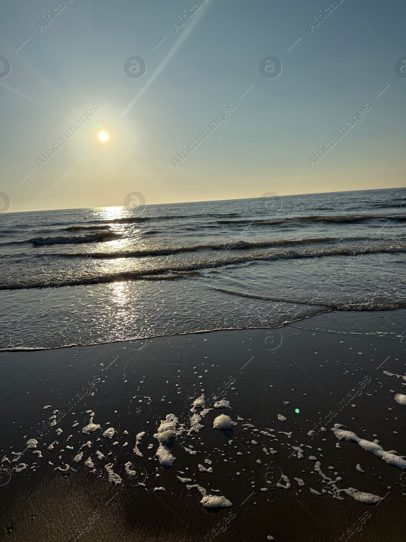 Wavy sea and beautiful sky at sunset Photo of Wavy sea and beautiful sky at sunset