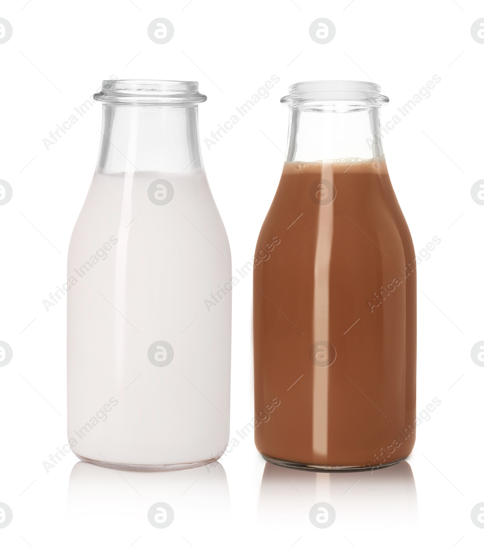 Chocolate drink and milk in glass bottles isolated on white Image of Chocolate drink and milk in glass bottles isolated on white
