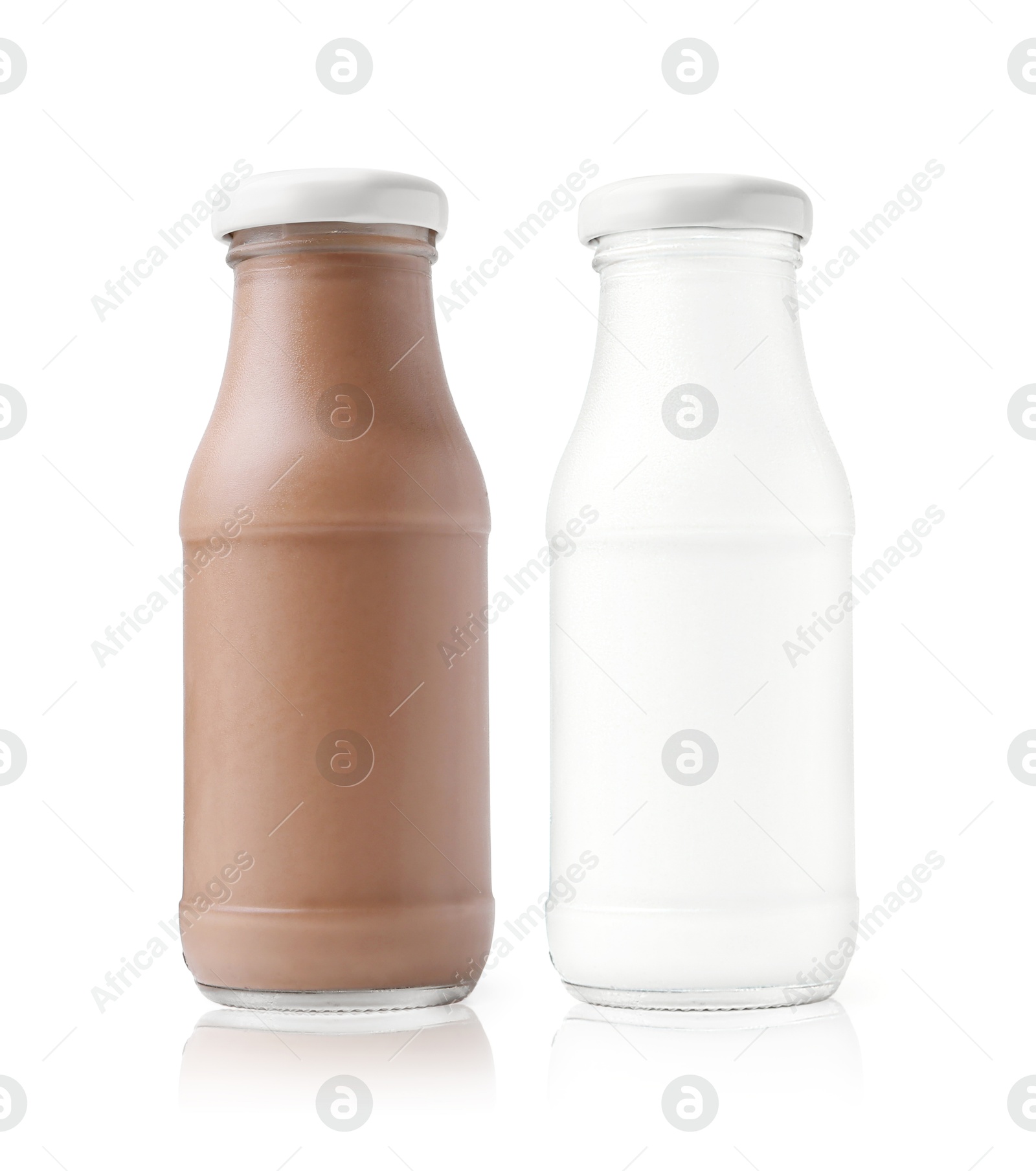 Chocolate drink and milk in glass bottles isolated on white Image of Chocolate drink and milk in glass bottles isolated on white