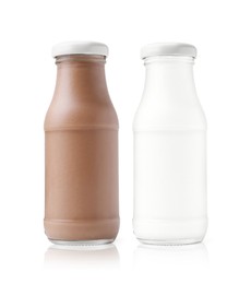 Image of Chocolate drink and milk in glass bottles isolated on white