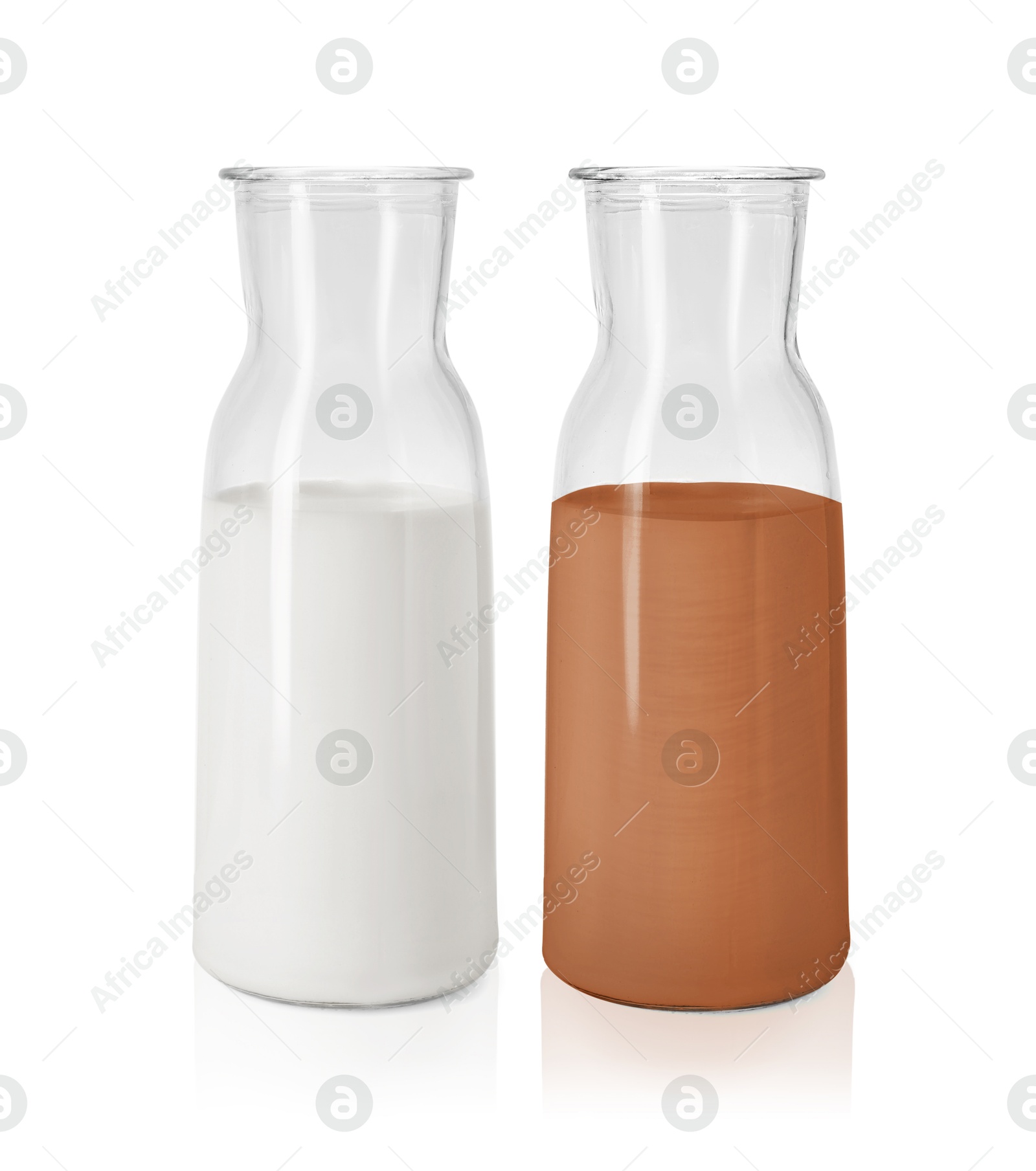 Chocolate drink and milk in glass bottles isolated on white Image of Chocolate drink and milk in glass bottles isolated on white