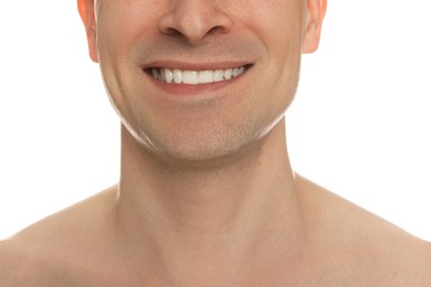 Photo of Smiling man after shaving on white background, closeup