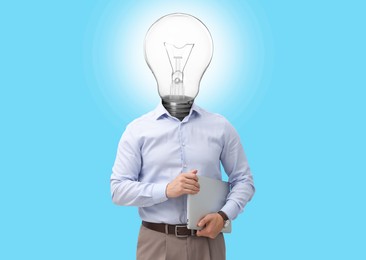 Image of Man with glowing lightbulb instead of head and laptop on light blue background