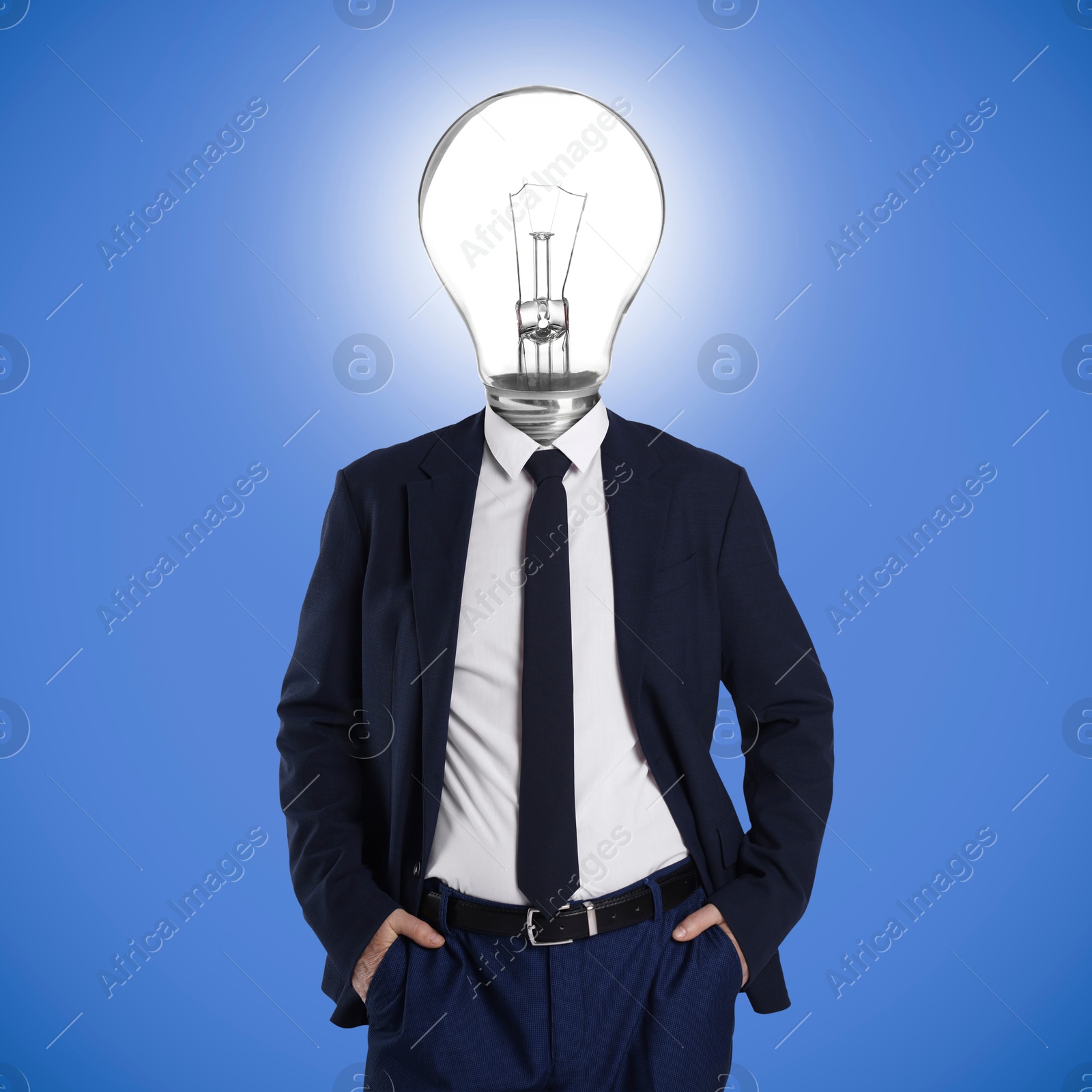Image of Man with glowing light bulb instead of head on blue background
