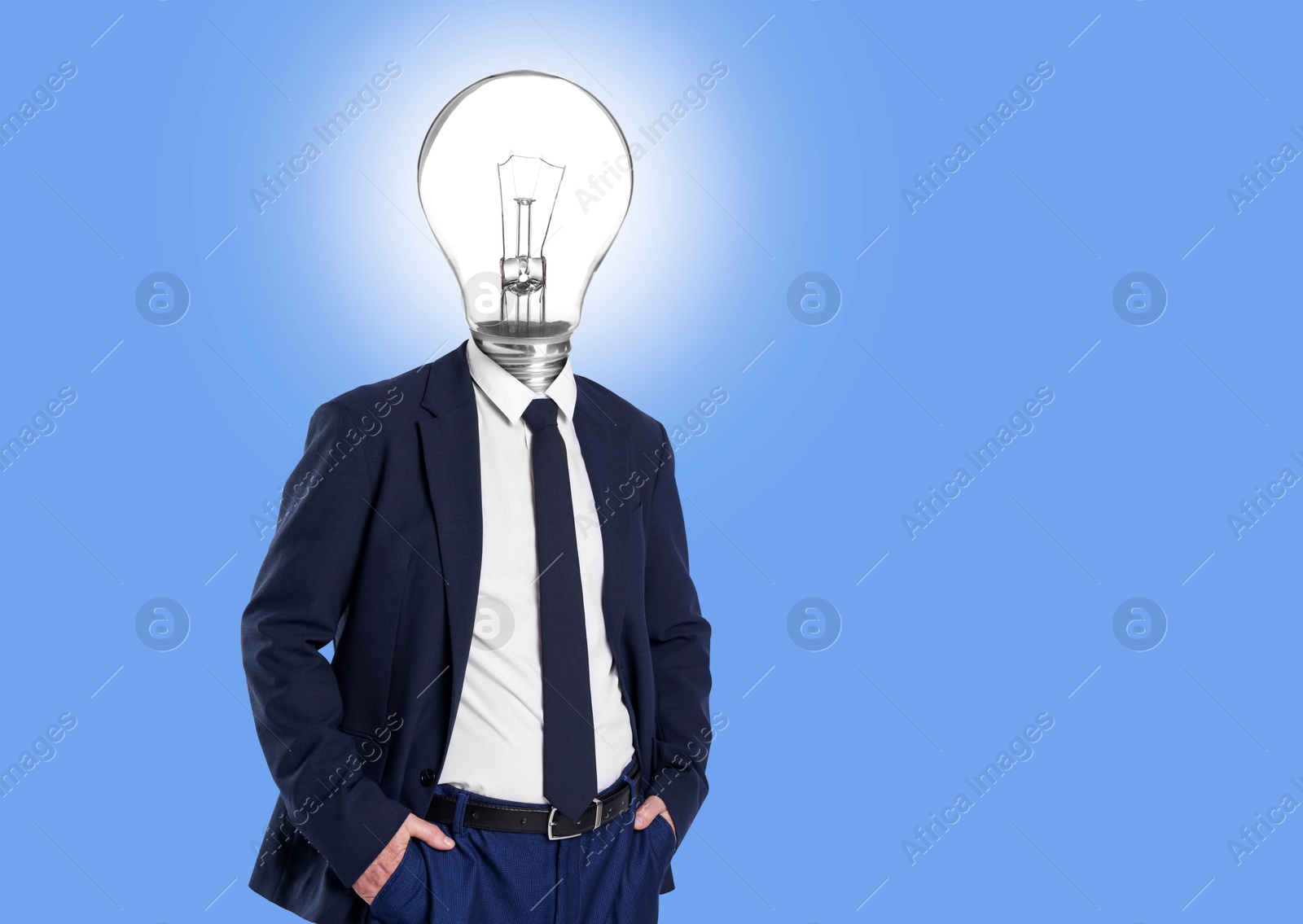Image of Man with glowing lightbulb instead of head on light blue background. Space for text