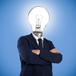 Image of Man with glowing lightbulb instead of head on light blue background