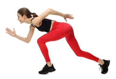 Photo of Runner in starting position on white background