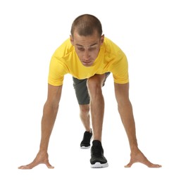 Photo of Runner in starting position on white background