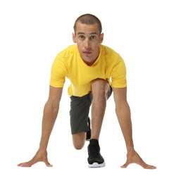 Photo of Runner in starting position on white background