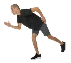 Photo of Man in sportswear running on white background
