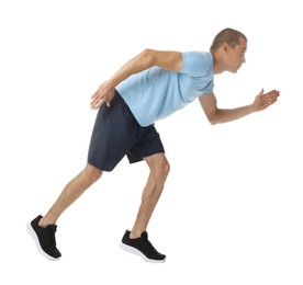 Photo of Man in sportswear running on white background