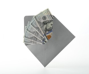 Photo of Money bonus. Envelope with dollar banknotes isolated on white