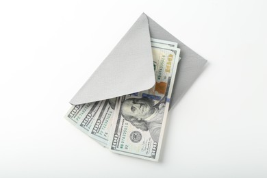 Photo of Money bonus. Envelope with dollar banknotes isolated on white, top view