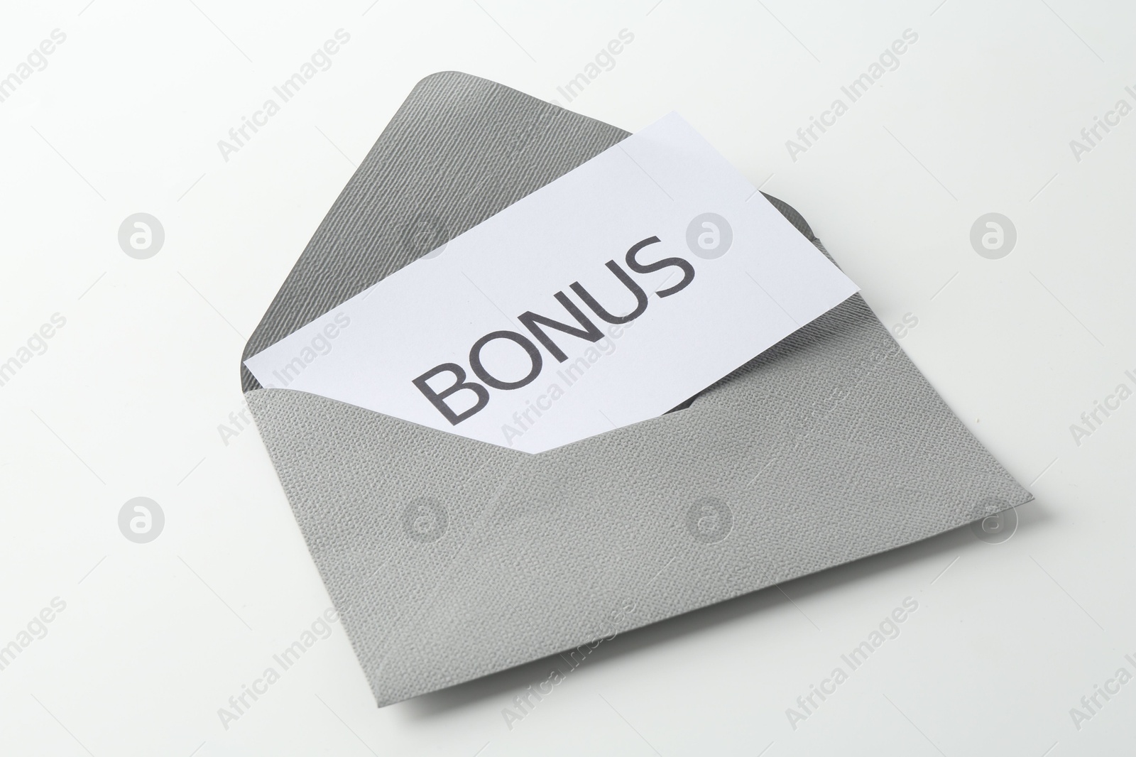 Envelope with word Bonus isolated on white Photo of Envelope with word Bonus isolated on white