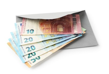 Photo of Money bonus. Envelope with euro banknotes isolated on white