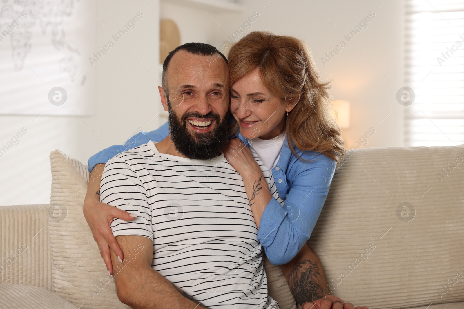Portrait of happy mature couple at home Photo of Portrait of happy mature couple at home