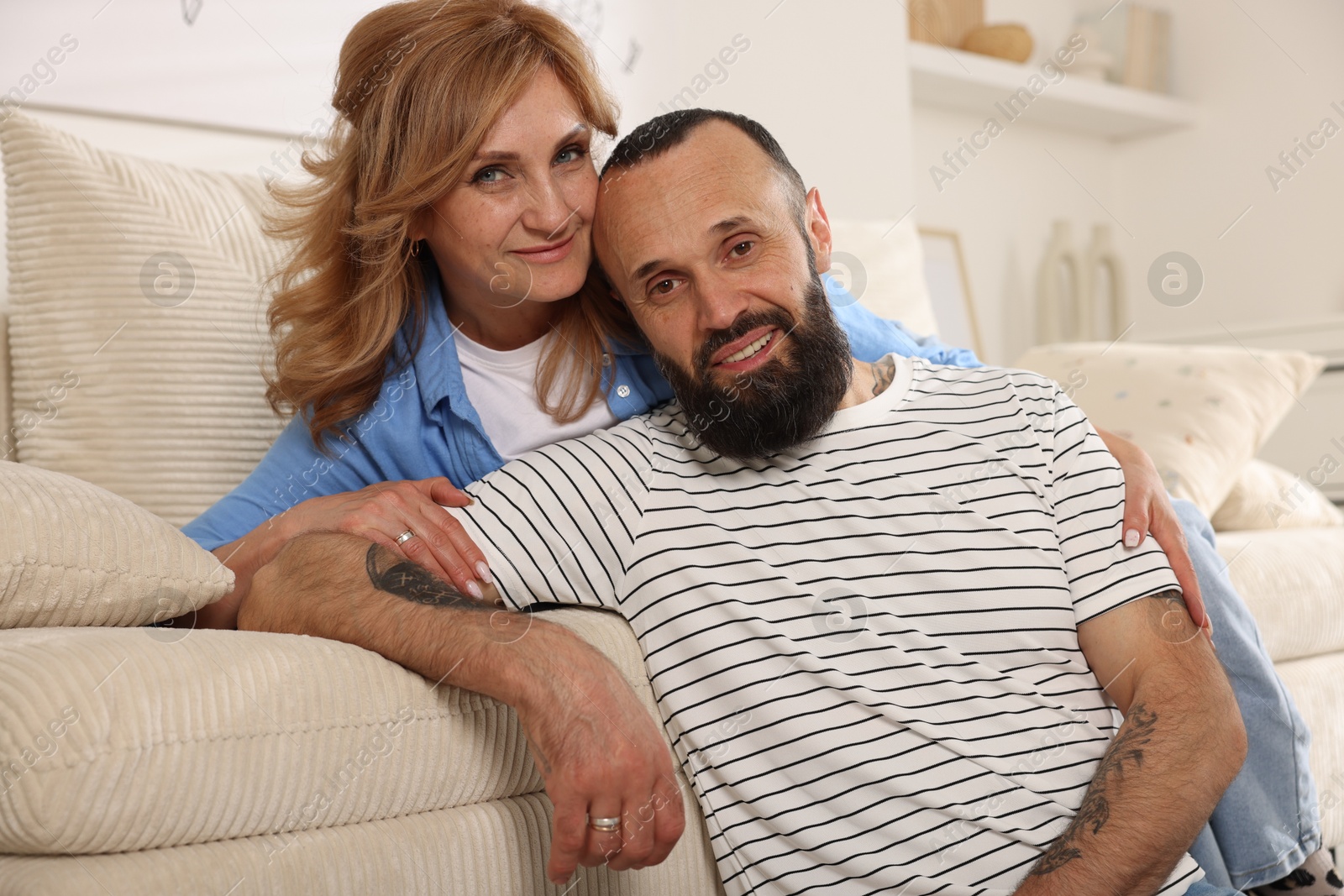 Portrait of happy mature couple at home Photo of Portrait of happy mature couple at home