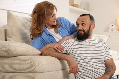 Photo of Portrait of lovely mature couple at home