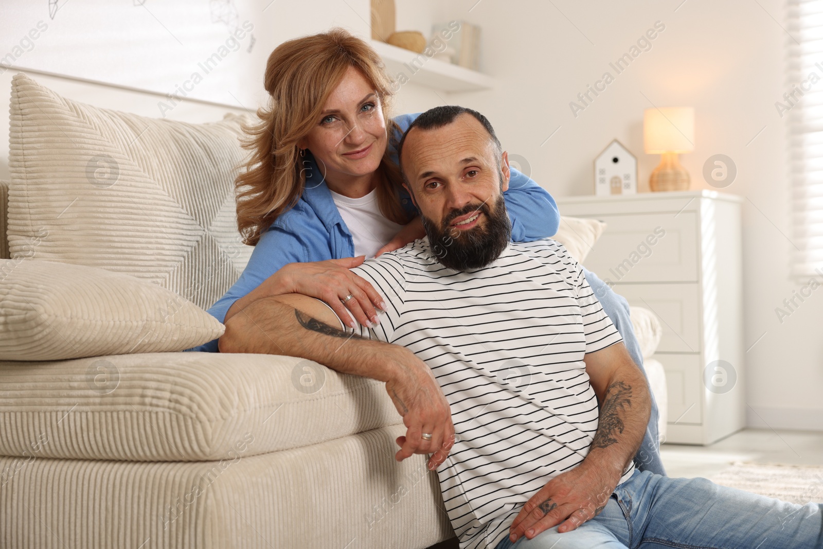 Portrait of happy mature couple at home Photo of Portrait of happy mature couple at home