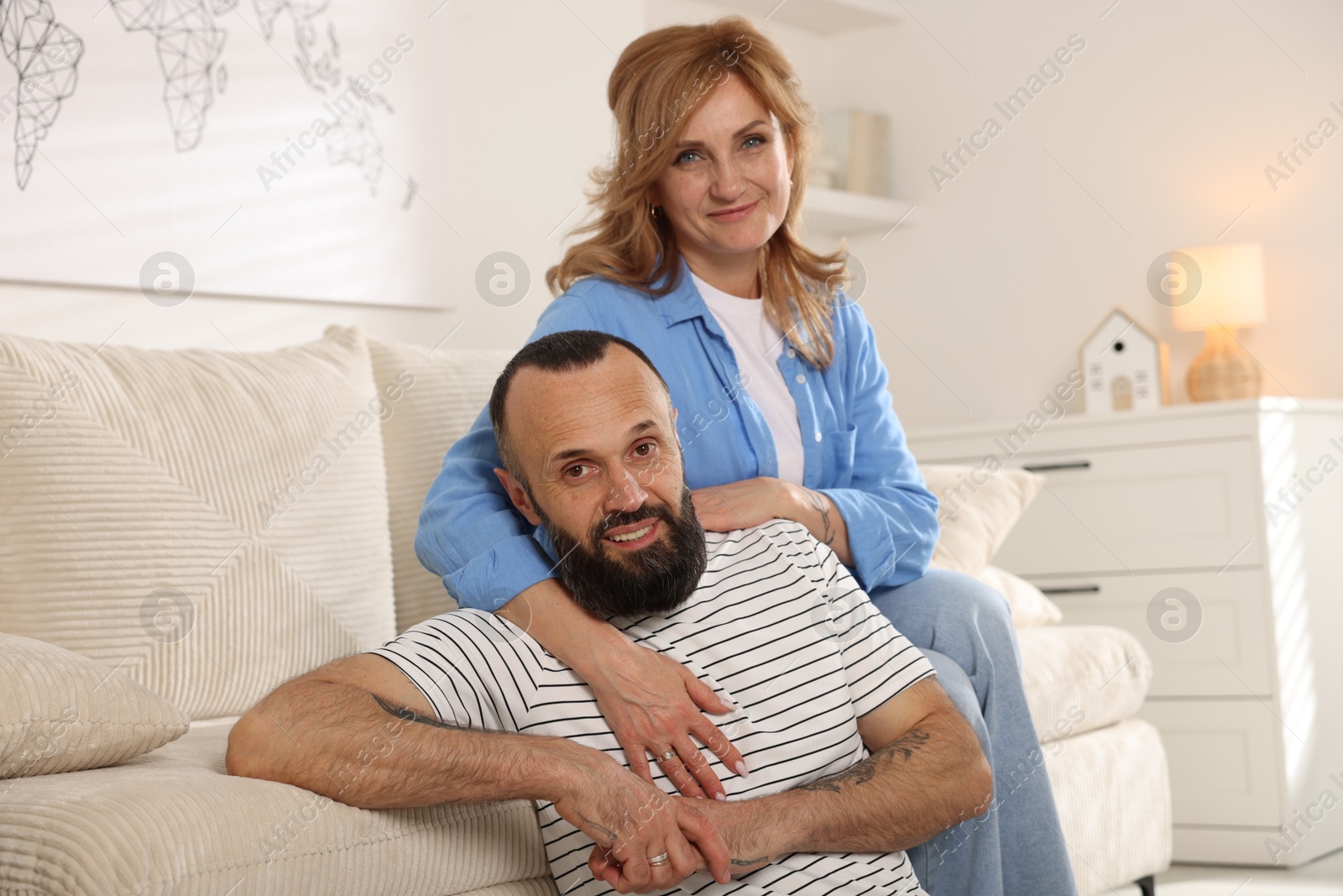 Portrait of happy mature couple at home Photo of Portrait of happy mature couple at home