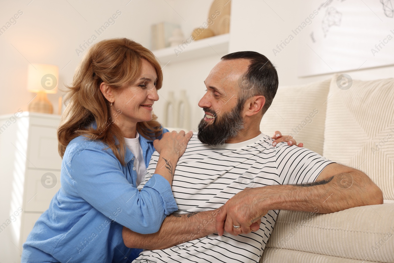 Portrait of happy mature couple at home Photo of Portrait of happy mature couple at home