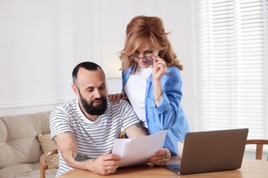 Photo of Lovely couple spending time together at home