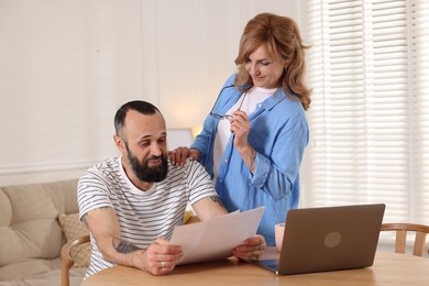 Photo of Lovely couple spending time together at home