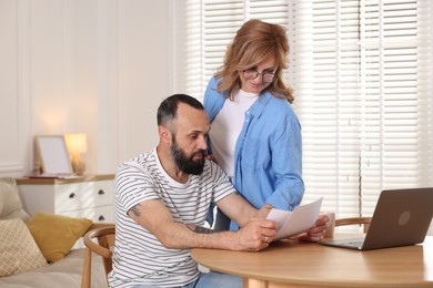 Photo of Lovely couple spending time together at home