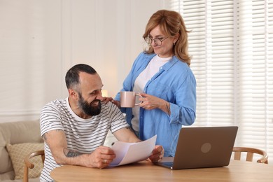 Photo of Lovely couple spending time together at home