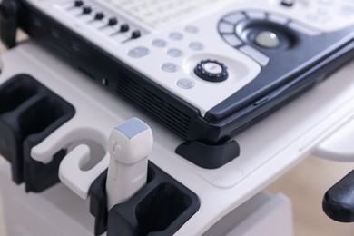Photo of Modern ultrasound machine in clinic, closeup. Medical equipment