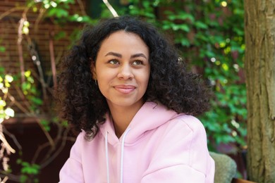 Photo of Portrait of beautiful Latin American woman outdoors