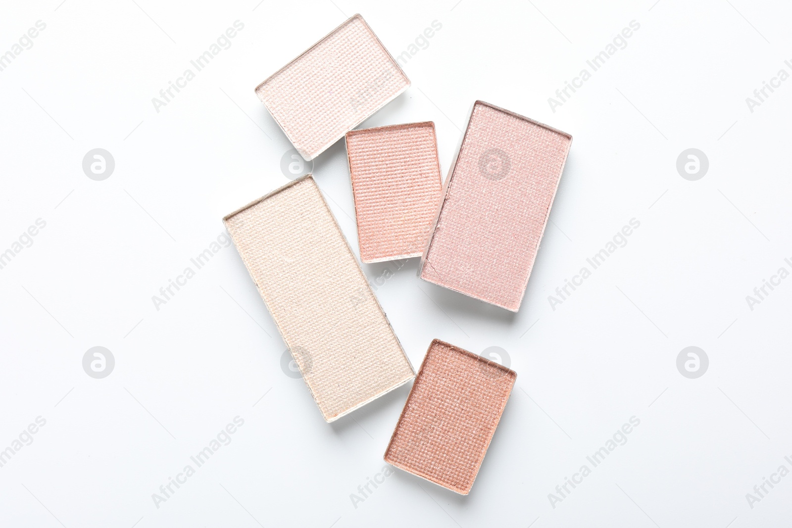 Beautiful eye shadow refill pans on white background, flat lay Photo of Beautiful eye shadow refill pans on white background, flat lay