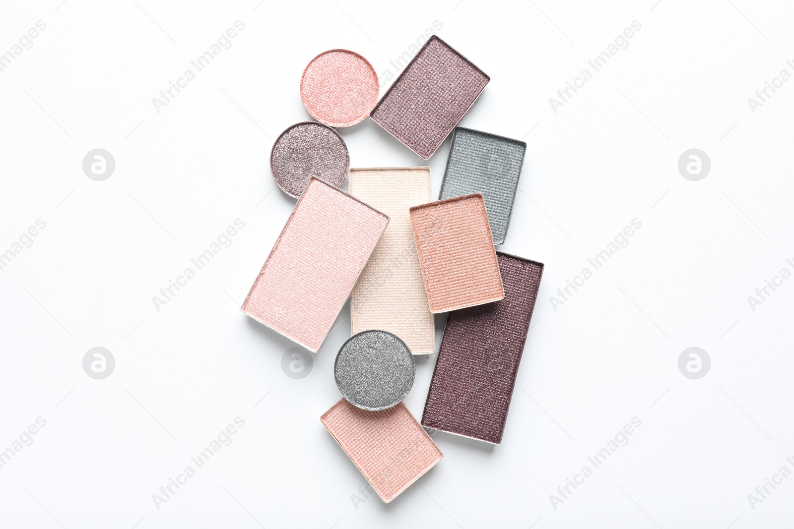 Beautiful eye shadow refill pans on white background, flat lay Photo of Beautiful eye shadow refill pans on white background, flat lay