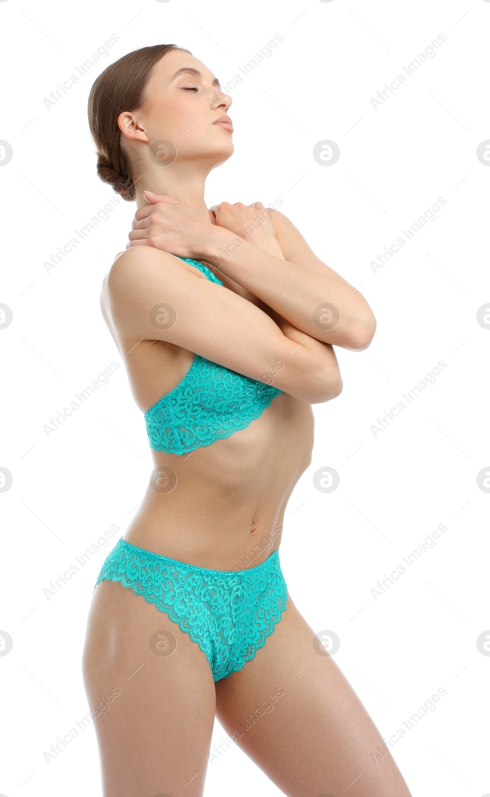 Woman wearing beautiful underwear on white background Photo of Woman wearing beautiful underwear on white background