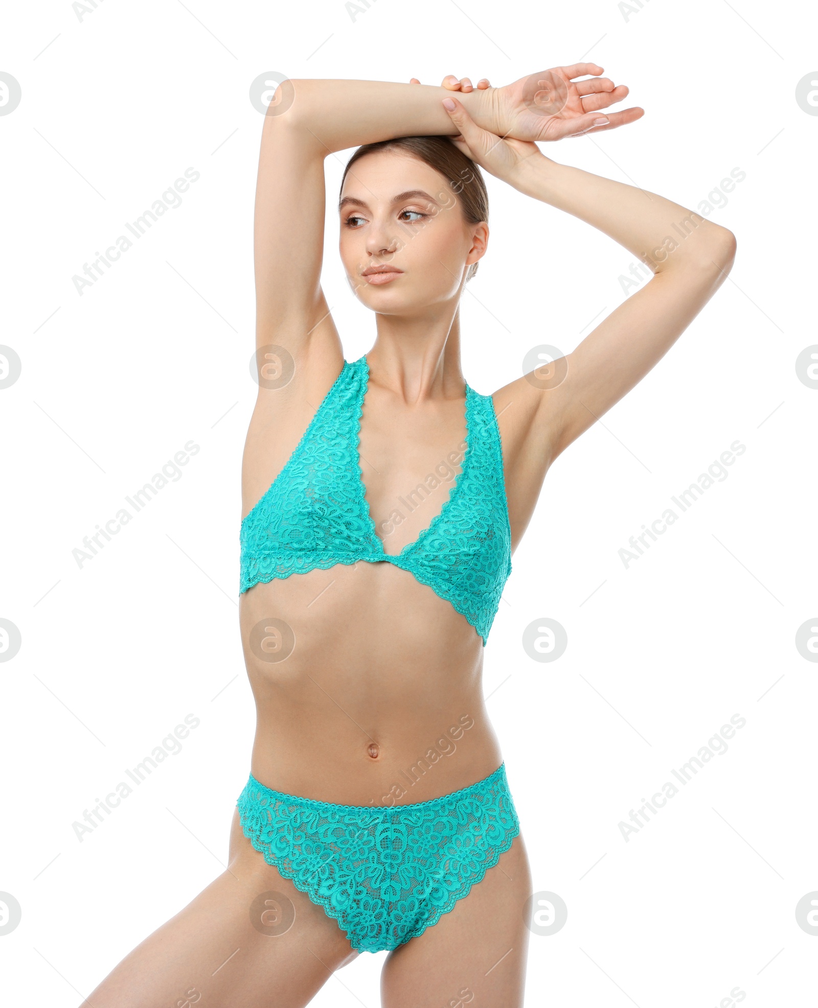 Woman wearing beautiful underwear on white background Photo of Woman wearing beautiful underwear on white background