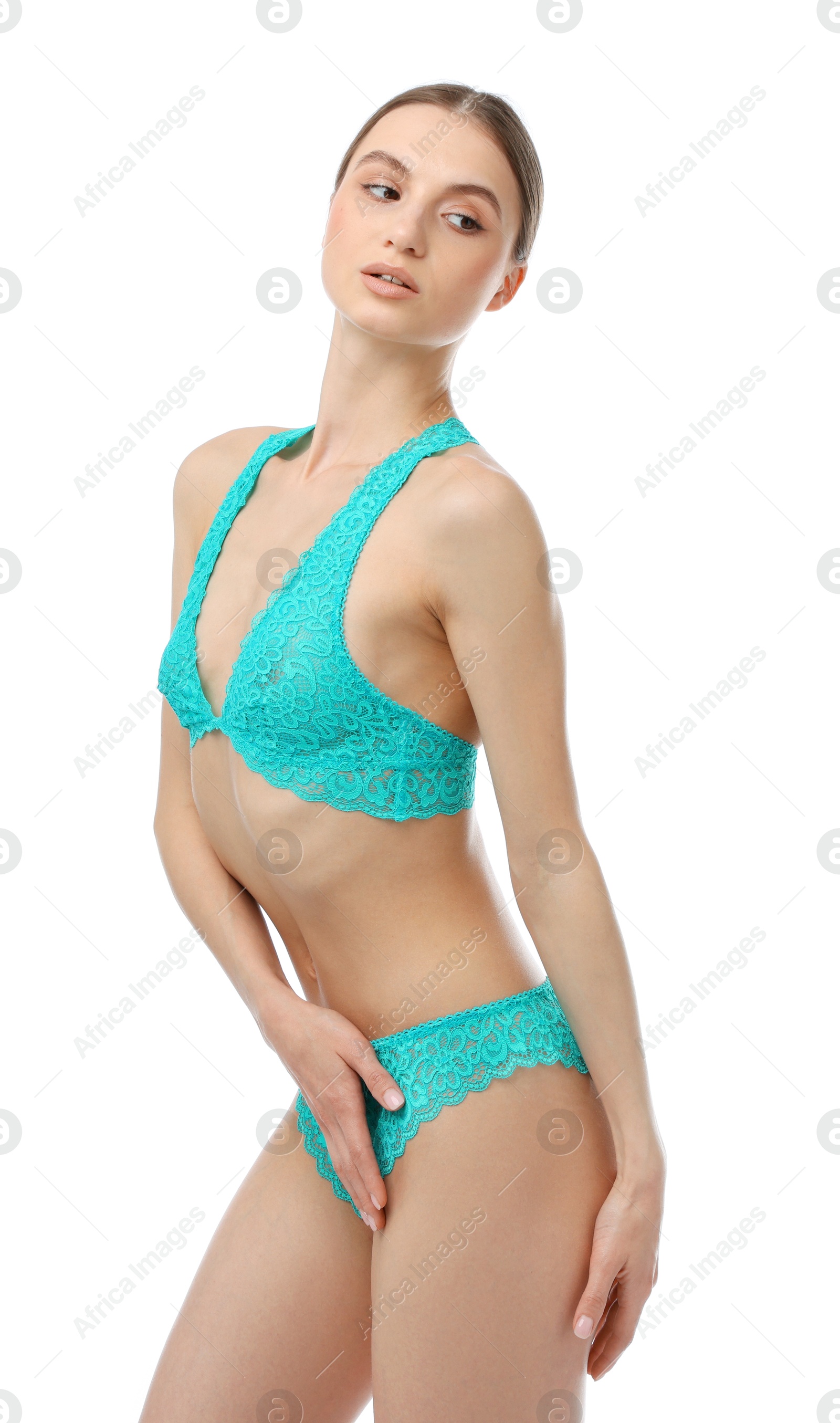 Woman wearing beautiful underwear on white background Photo of Woman wearing beautiful underwear on white background