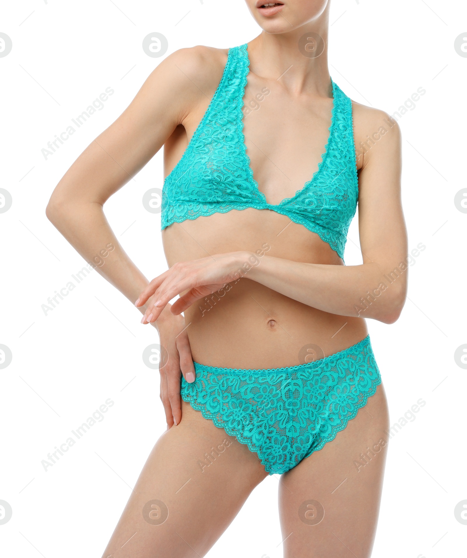 Woman wearing beautiful underwear on white background, closeup Photo of Woman wearing beautiful underwear on white background, closeup