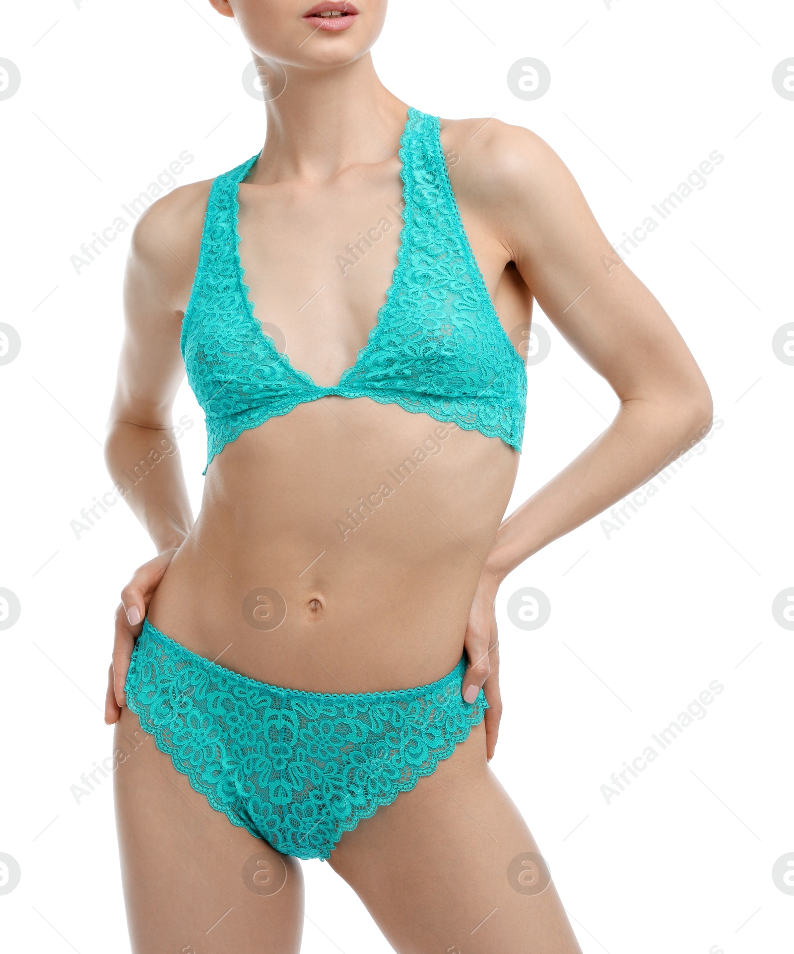 Woman wearing beautiful underwear on white background, closeup Photo of Woman wearing beautiful underwear on white background, closeup
